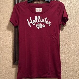 Worn once or twice Vintage Hollister Tee. Hibiscus flower. Excellent new shape.